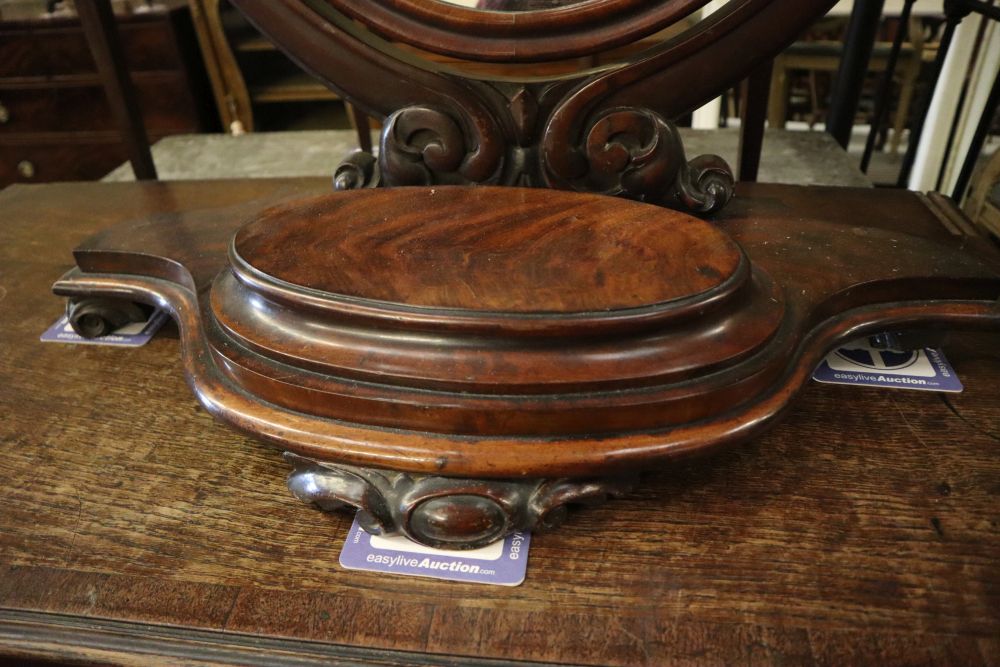 A Victorian mahogany toilet mirror, width 65cm, height 82cm